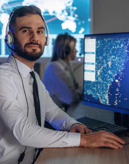 looking-at-the-camera-people-are-working-by-compu-2025-03-18-20-06-16-utc (1)